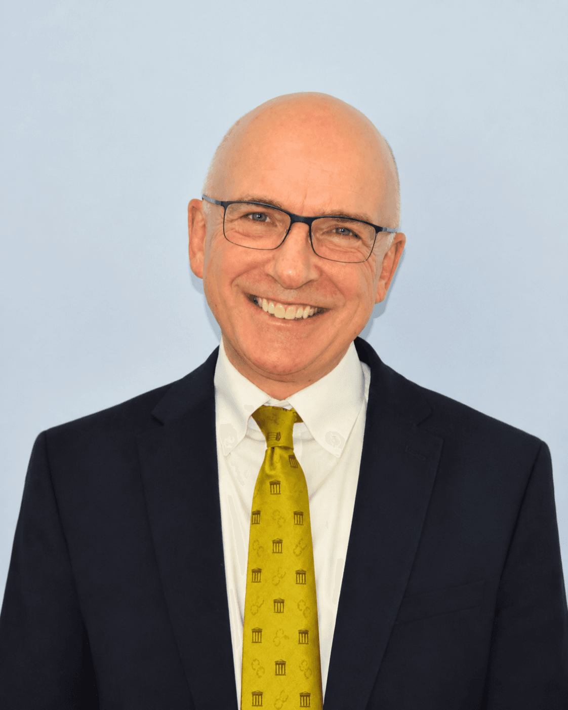 Mr. Neil Hawkins, Founding Principal.