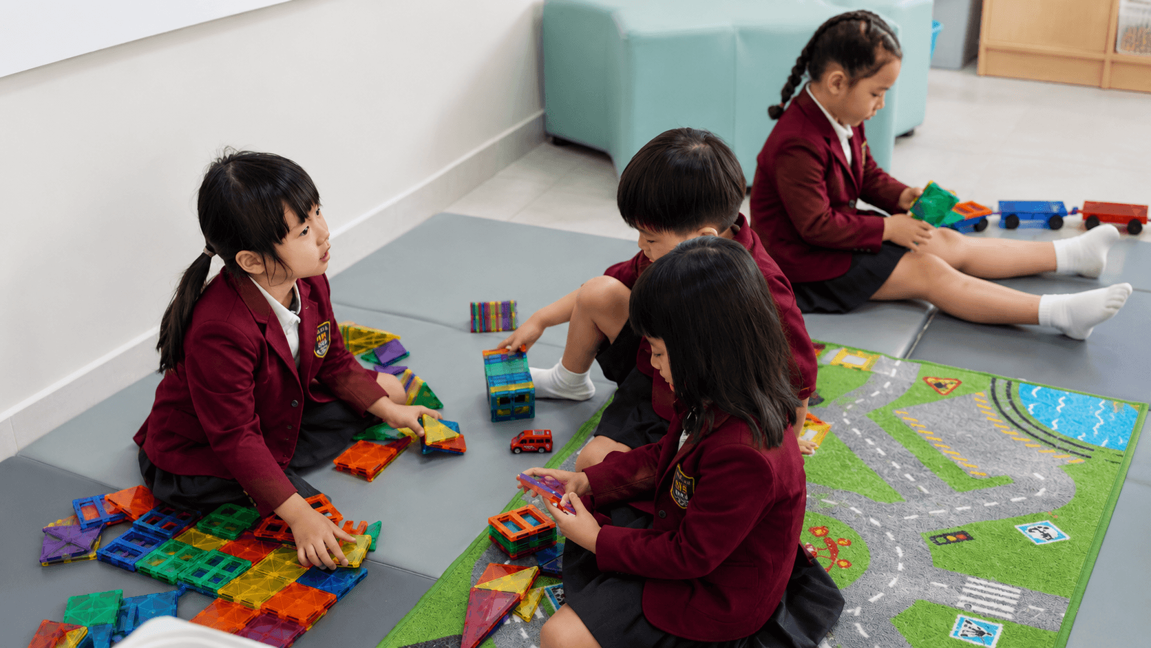 Children playing and learning together at Concord College.
